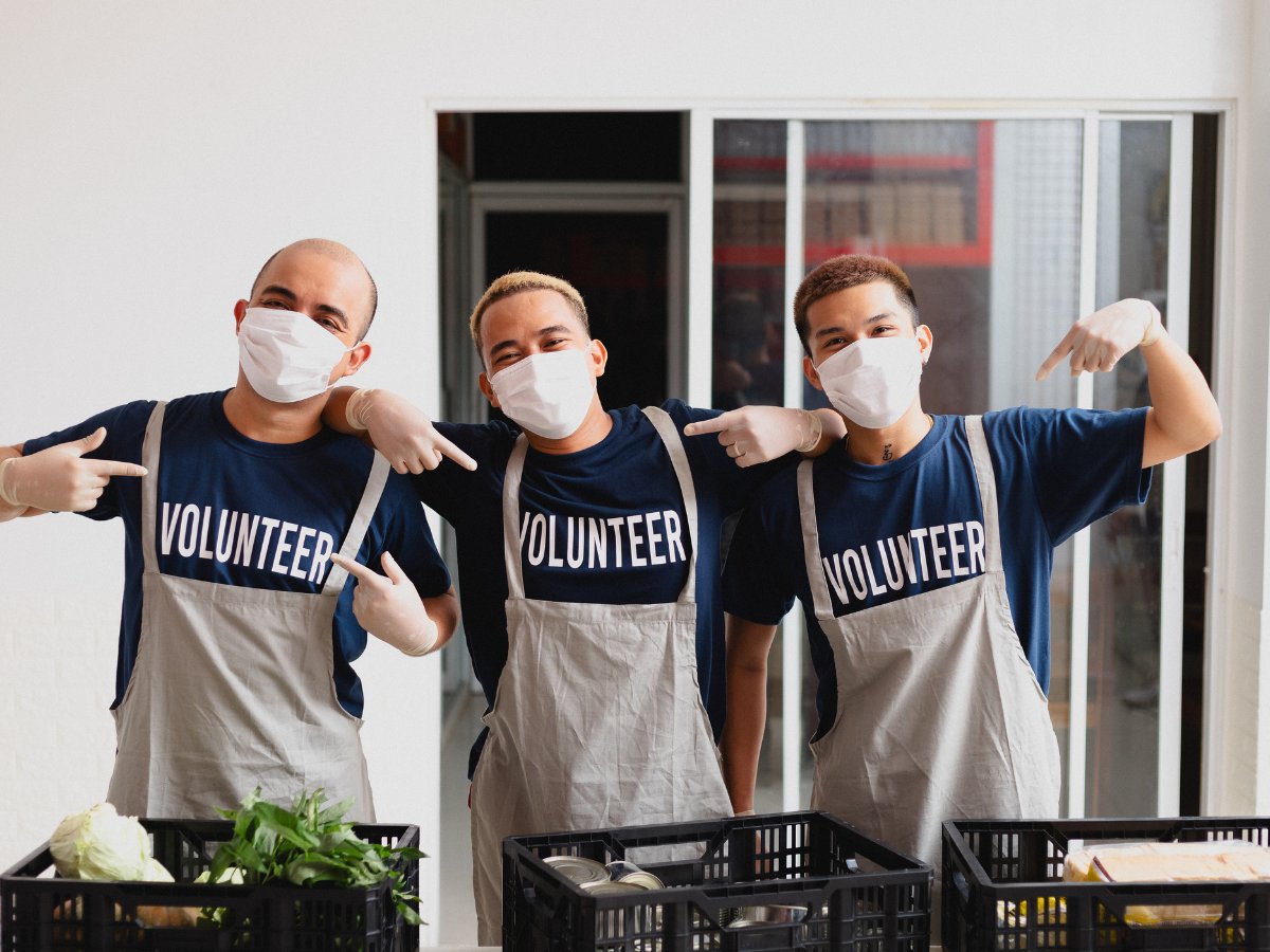 Volunteers packing crates of produce